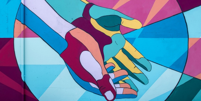 mural of hands outstretched 